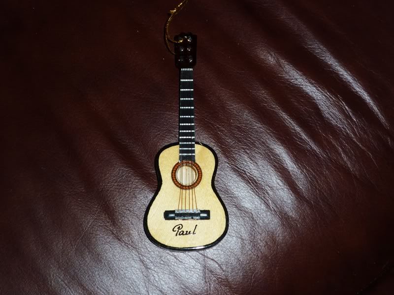 http://i777.photobucket.com/albums/yy58/mill2153/guitarornament.jpg